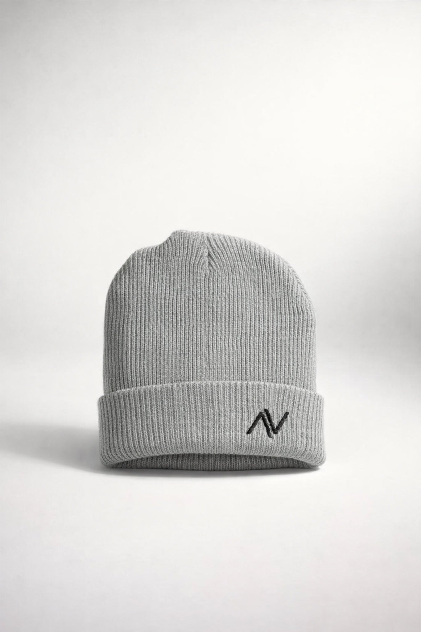 Ribbed knit beanie with embroidered logo front view, soft premium winter hat for men and women