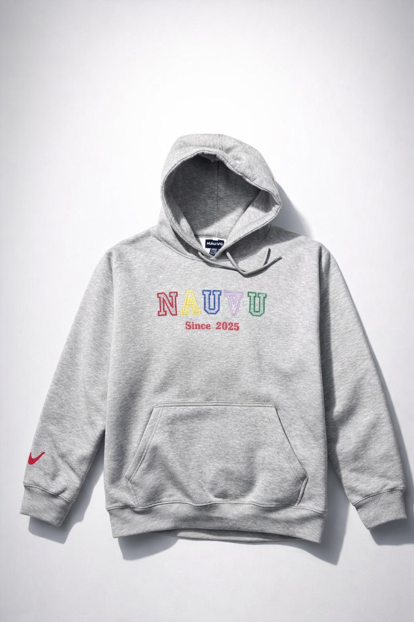 Gray hoodie with colorful 'NAUVU' branding on a white background