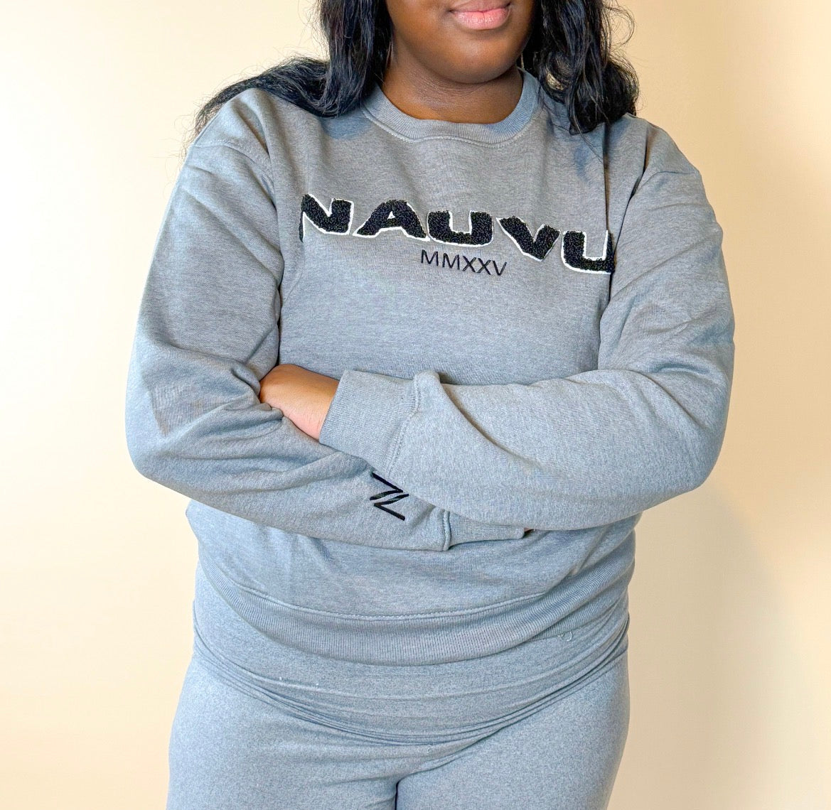 Premium women’s chenille varsity sweatshirt front view, embroidered sleeve logo, cotton fleece
